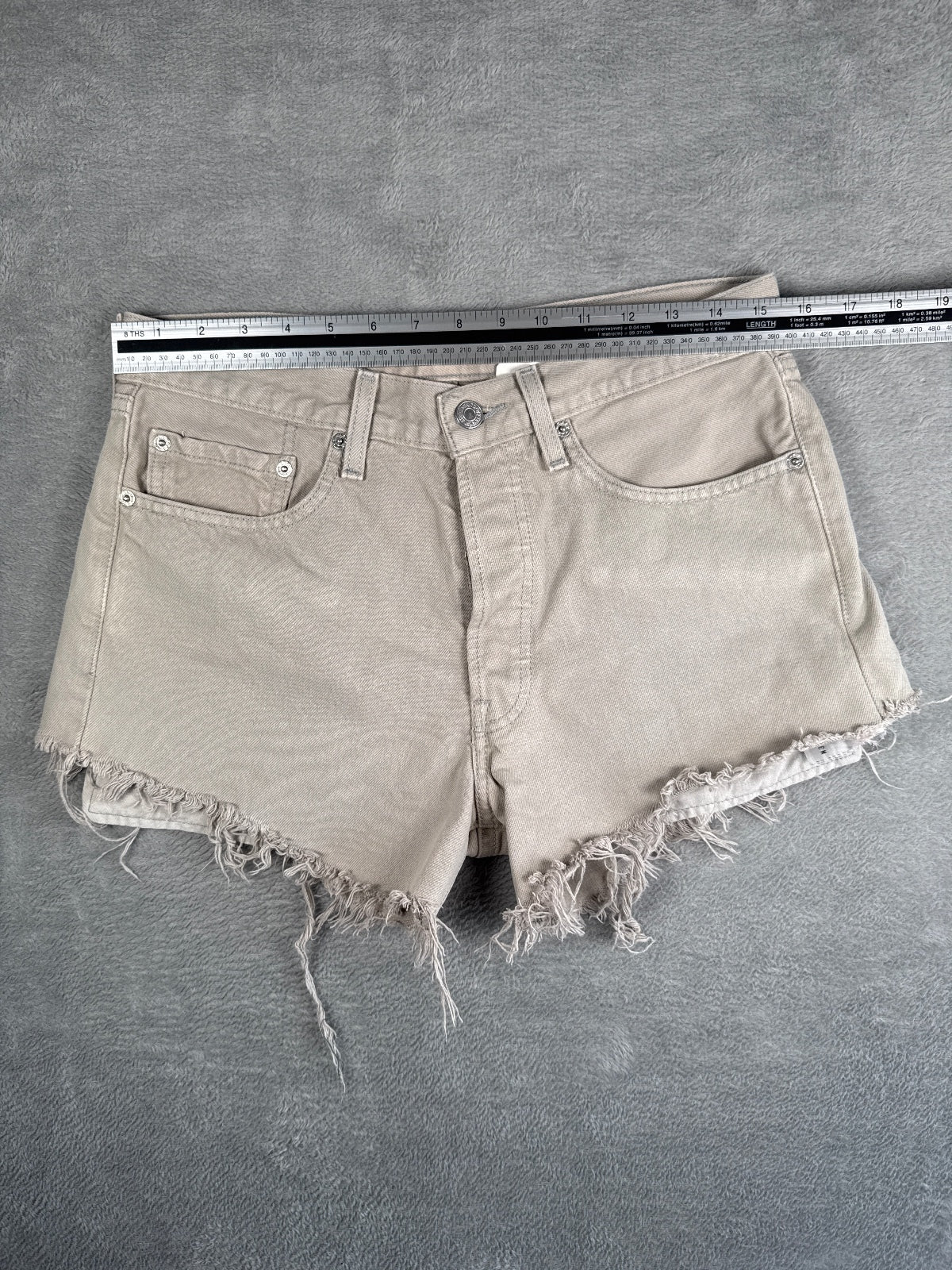 Vintage Levi's Beige High-Waisted Denim Cutoff Shorts - W31